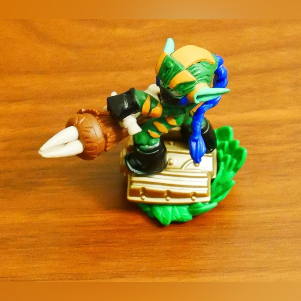Reptile Figurine with Green and Blue Accents